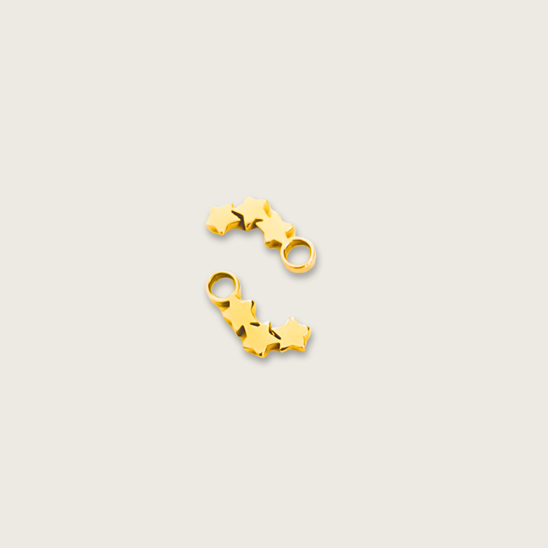 Triple star charms